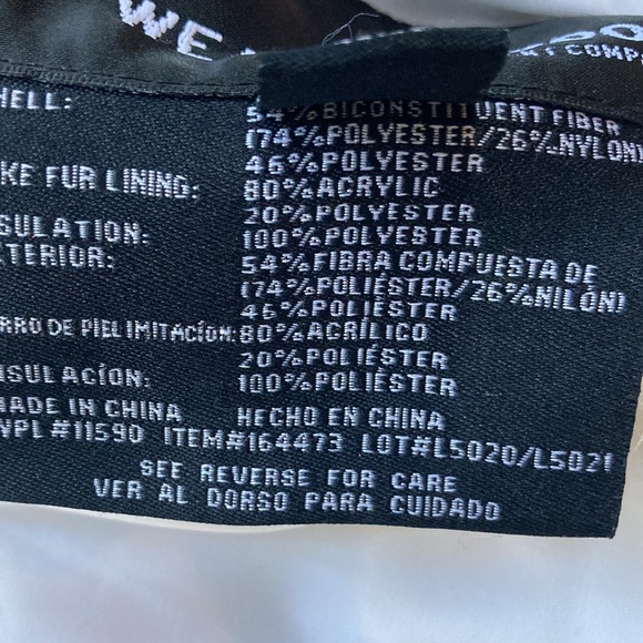 Reversible Weatherproof White and Faux Fur Vest - Picture 16 of 16